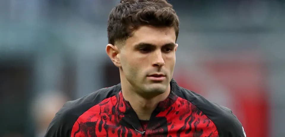 Player in red and black jersey during match