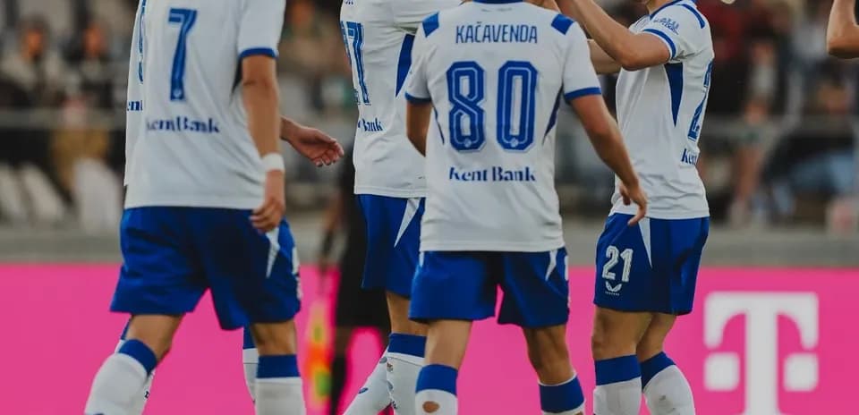 Players celebrating a goal during football match