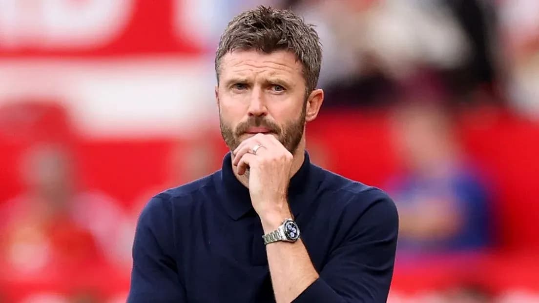 Coach observing match from the sidelines