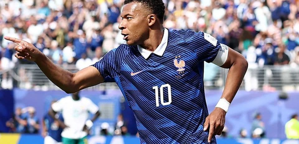 Kylian Mbappe Surpasses Ronaldo's World Cup Record with Two Goals in France's 3-0 Win Over Sweden