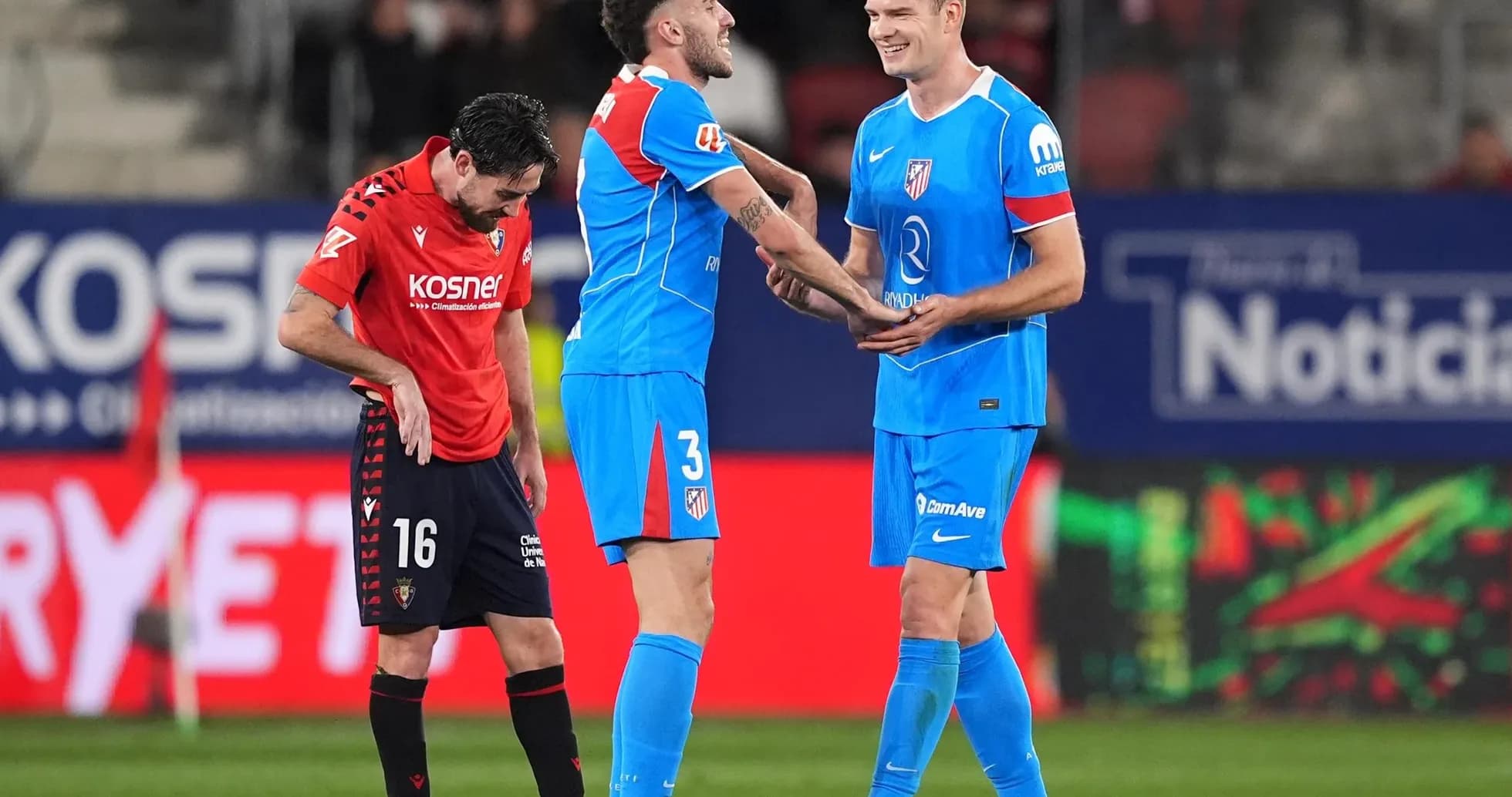 Atletico Madrid players celebrating on the field Atletico Madrid players celebrating on the field