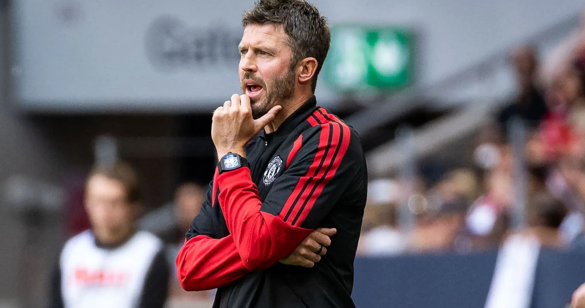 Coach gesturing during a football match on sidelines Coach gesturing during a football match on sidelines