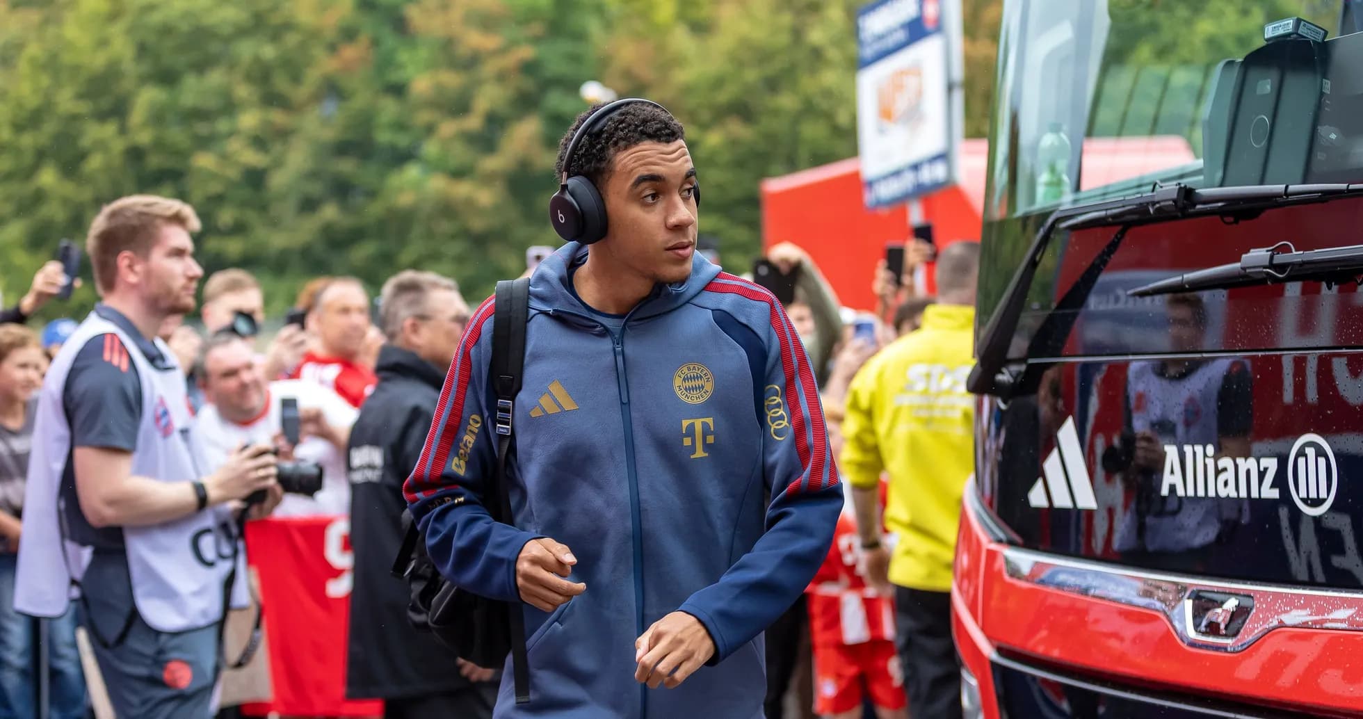 Player arriving at stadium with headphones on Player arriving at stadium with headphones on