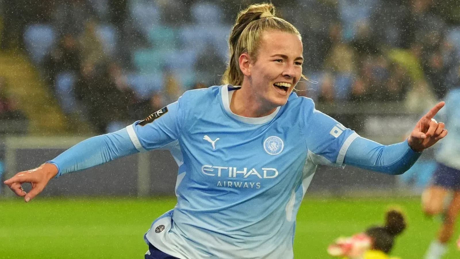 Player celebrating a goal during a match Player celebrating a goal during a match