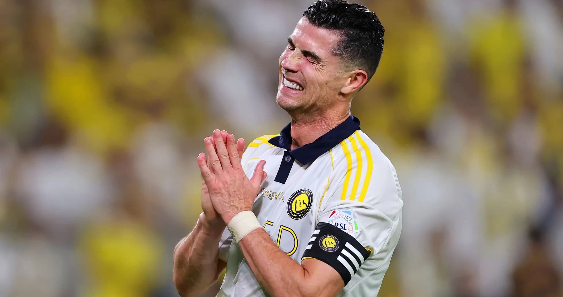 Player celebrating during a football match Player celebrating during a football match