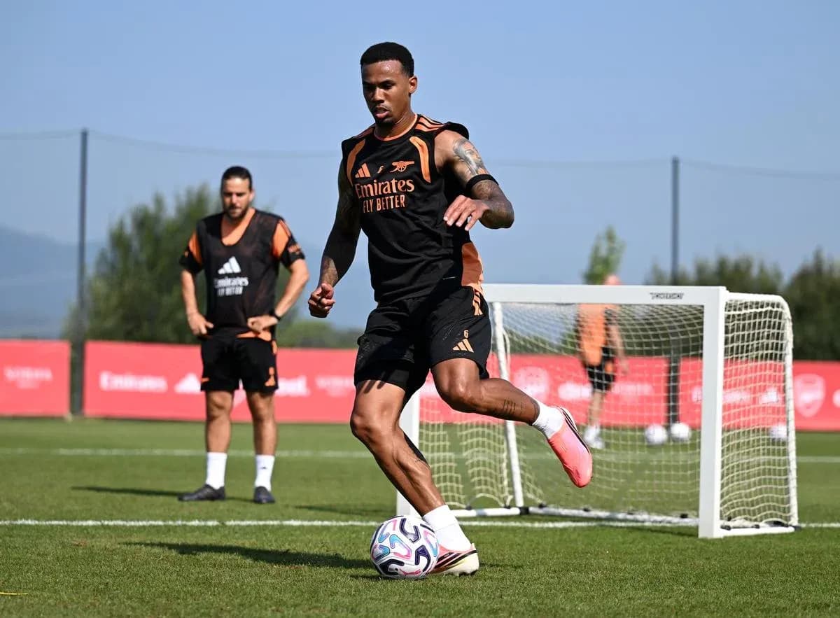 Player dribbling a soccer ball during training session Player dribbling a soccer ball during training session