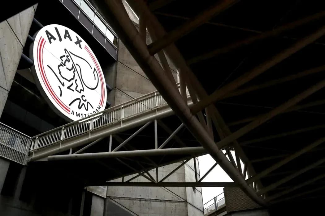 AJAX Amsterdam logo displayed on stadium exterior AJAX Amsterdam logo displayed on stadium exterior