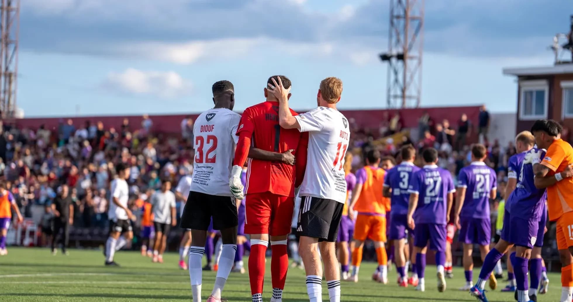 Players interacting after the match Players interacting after the match