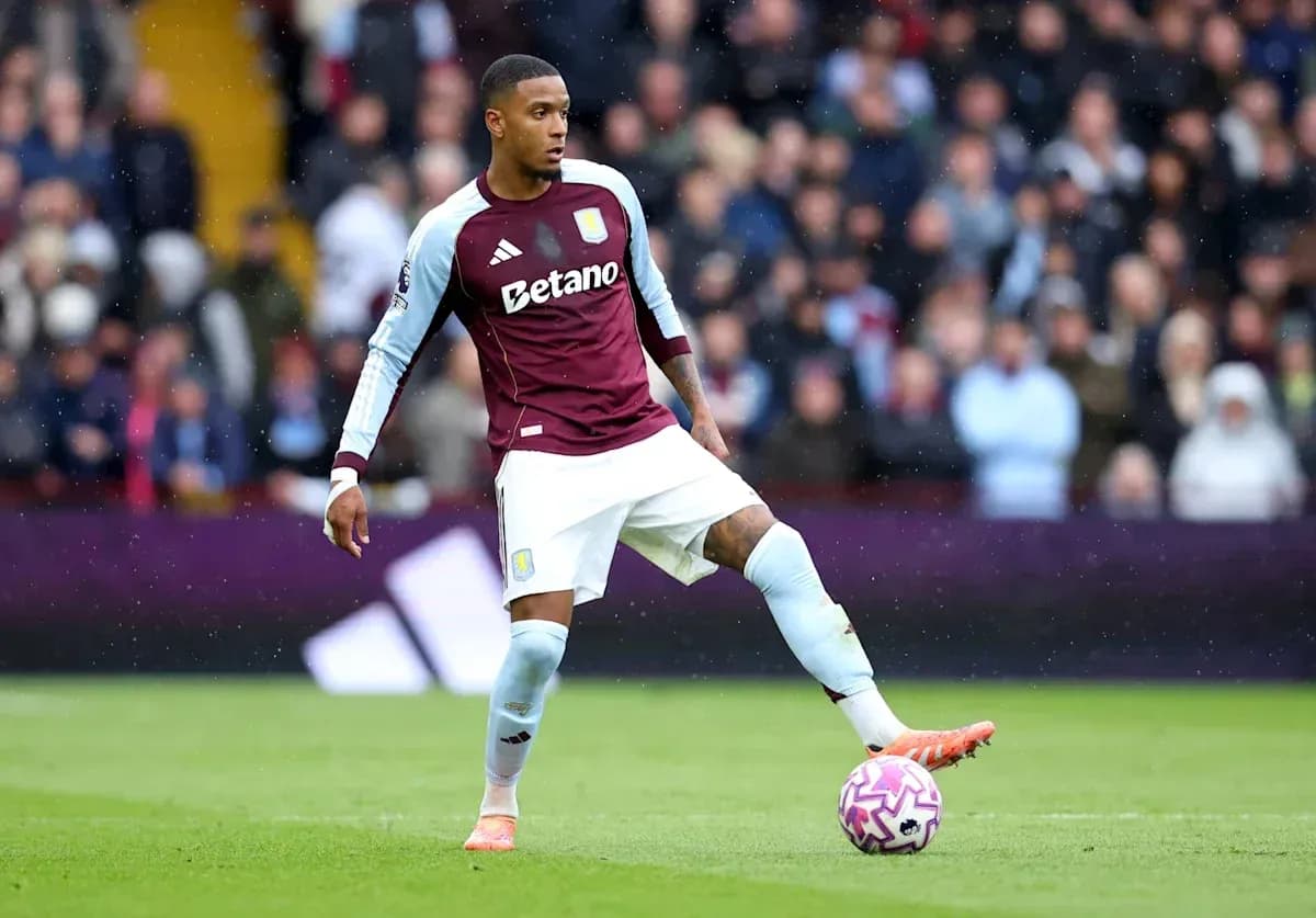 Player in Aston Villa kit controlling the ball Player in Aston Villa kit controlling the ball