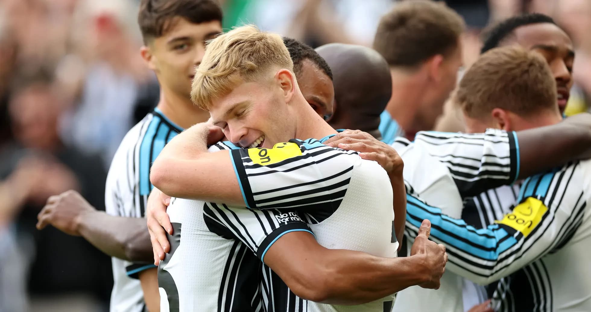 Players celebrating together after scoring a goal Players celebrating together after scoring a goal
