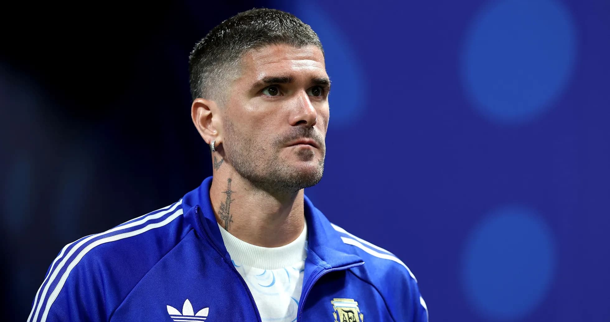 Player in blue jacket before match Player in blue jacket before match