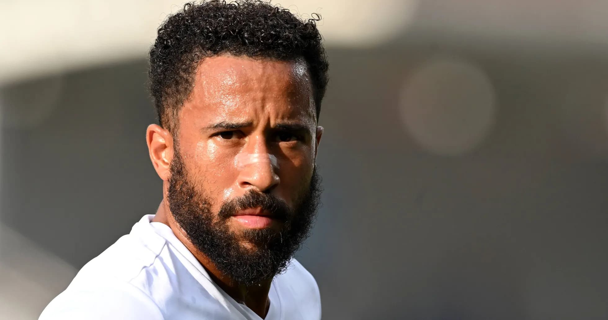 Player with beard looking towards the camera Player with beard looking towards the camera