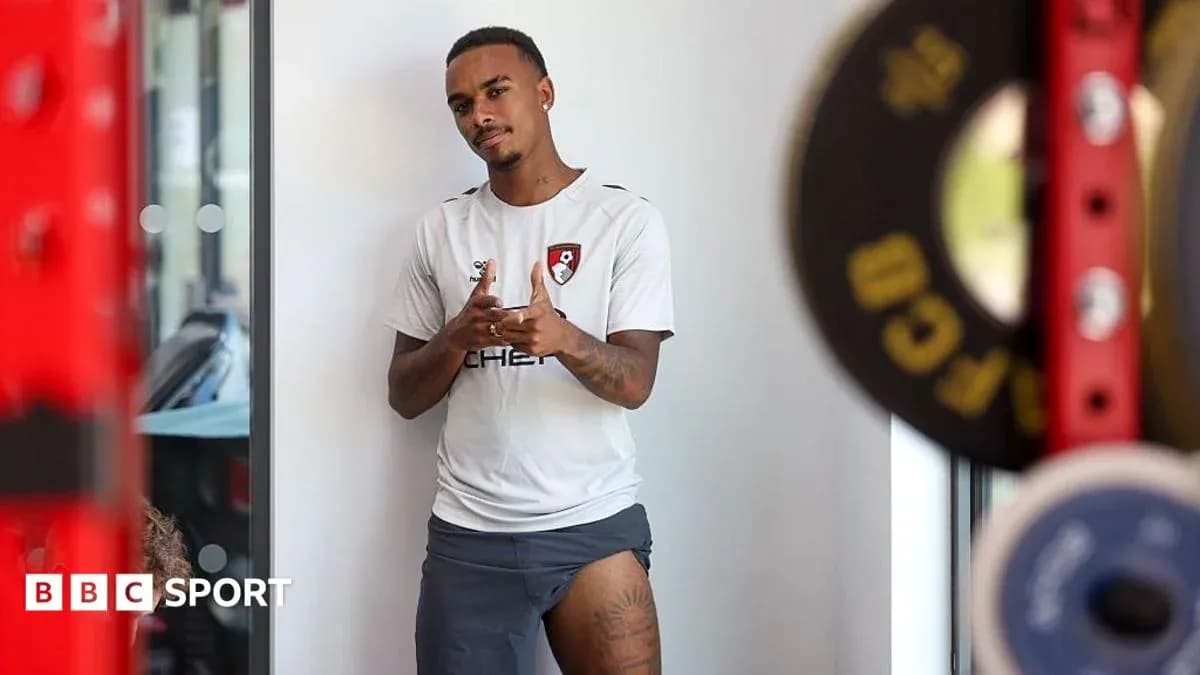 Player posing in training gear at gym Player posing in training gear at gym