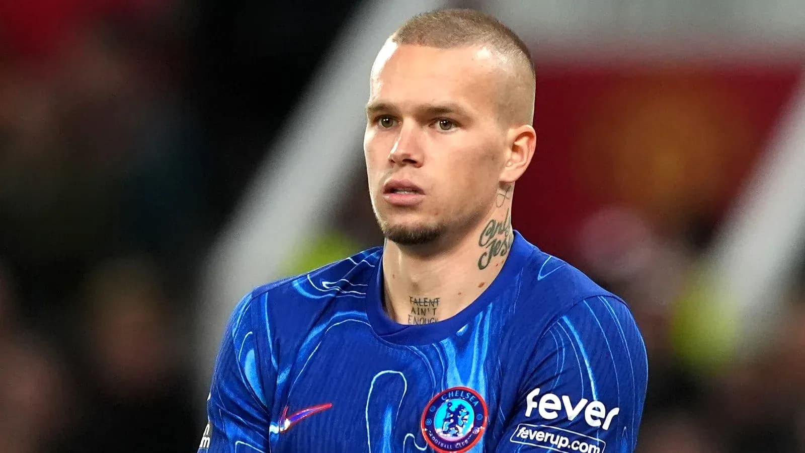 Player in blue Chelsea kit during match Player in blue Chelsea kit during match
