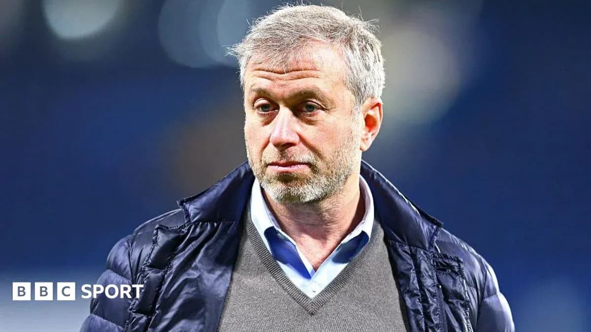 Man in a jacket during sports event Man in a jacket during sports event