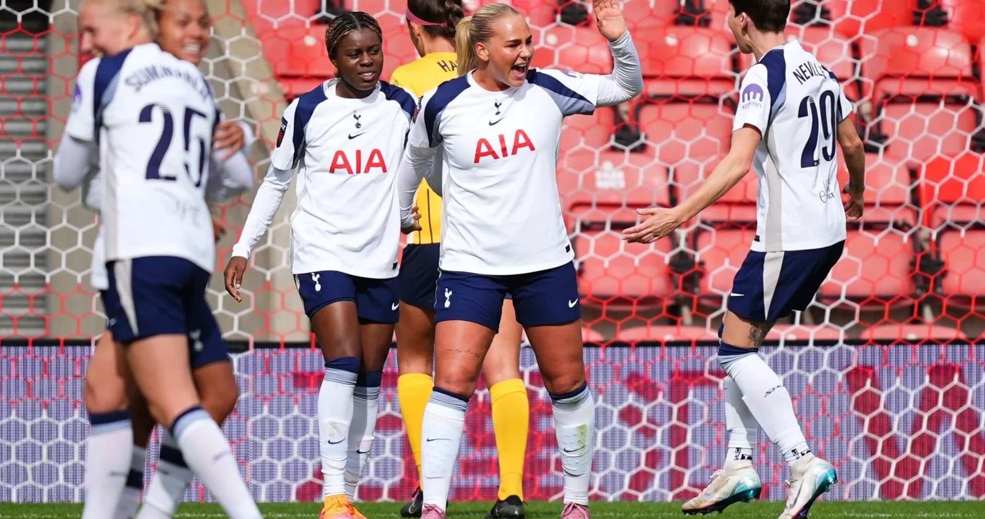 Tottenham players celebrating a goal Tottenham players celebrating a goal