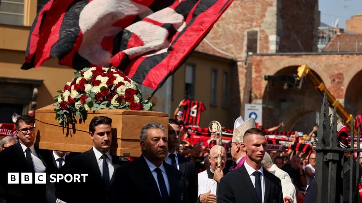 Funeral procession with casket and supporters in background Funeral procession with casket and supporters in background