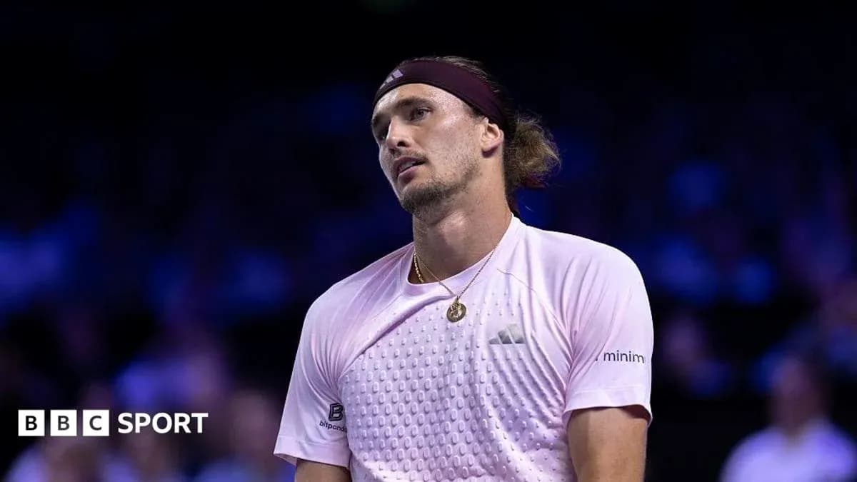 Tennis player looking up during a match Tennis player looking up during a match