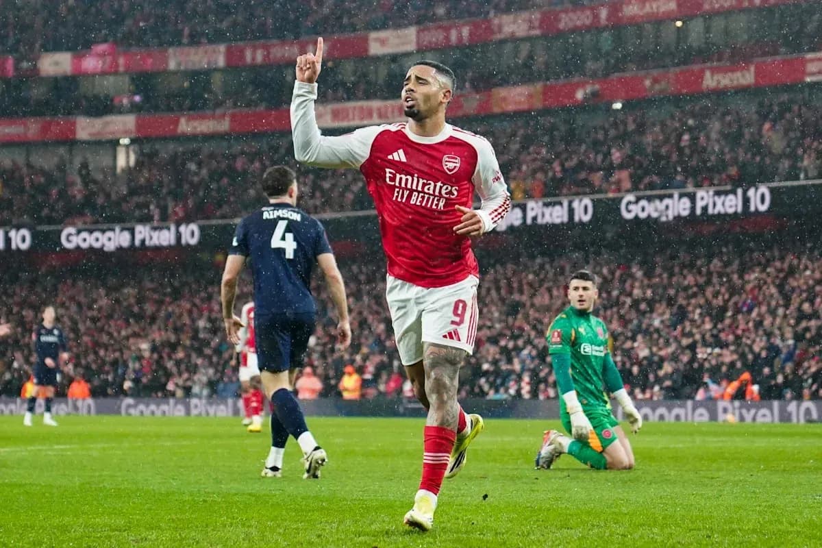 Arsenal player celebrating after scoring a goal Arsenal player celebrating after scoring a goal