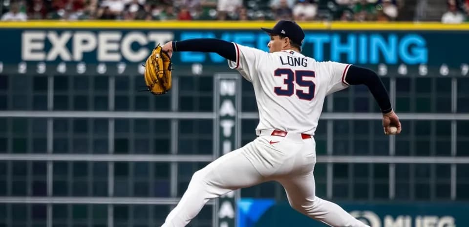 Pitcher throwing during a baseball game Pitcher throwing during a baseball game