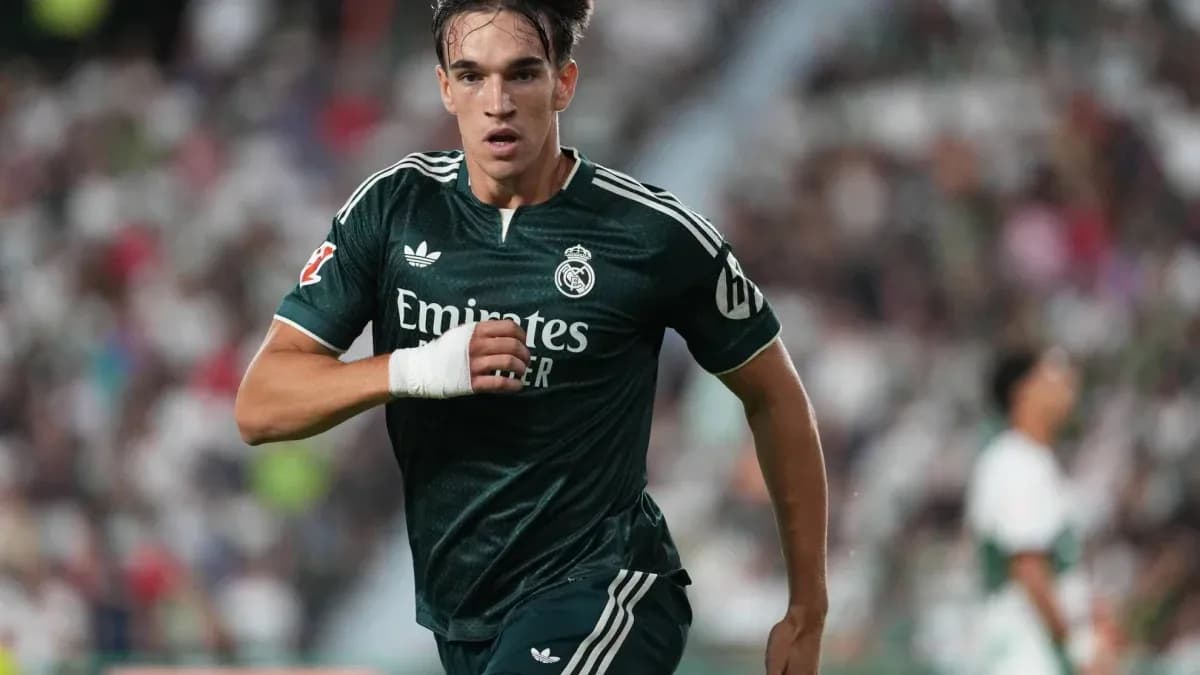 Player sprinting in green Real Madrid jersey Player sprinting in green Real Madrid jersey