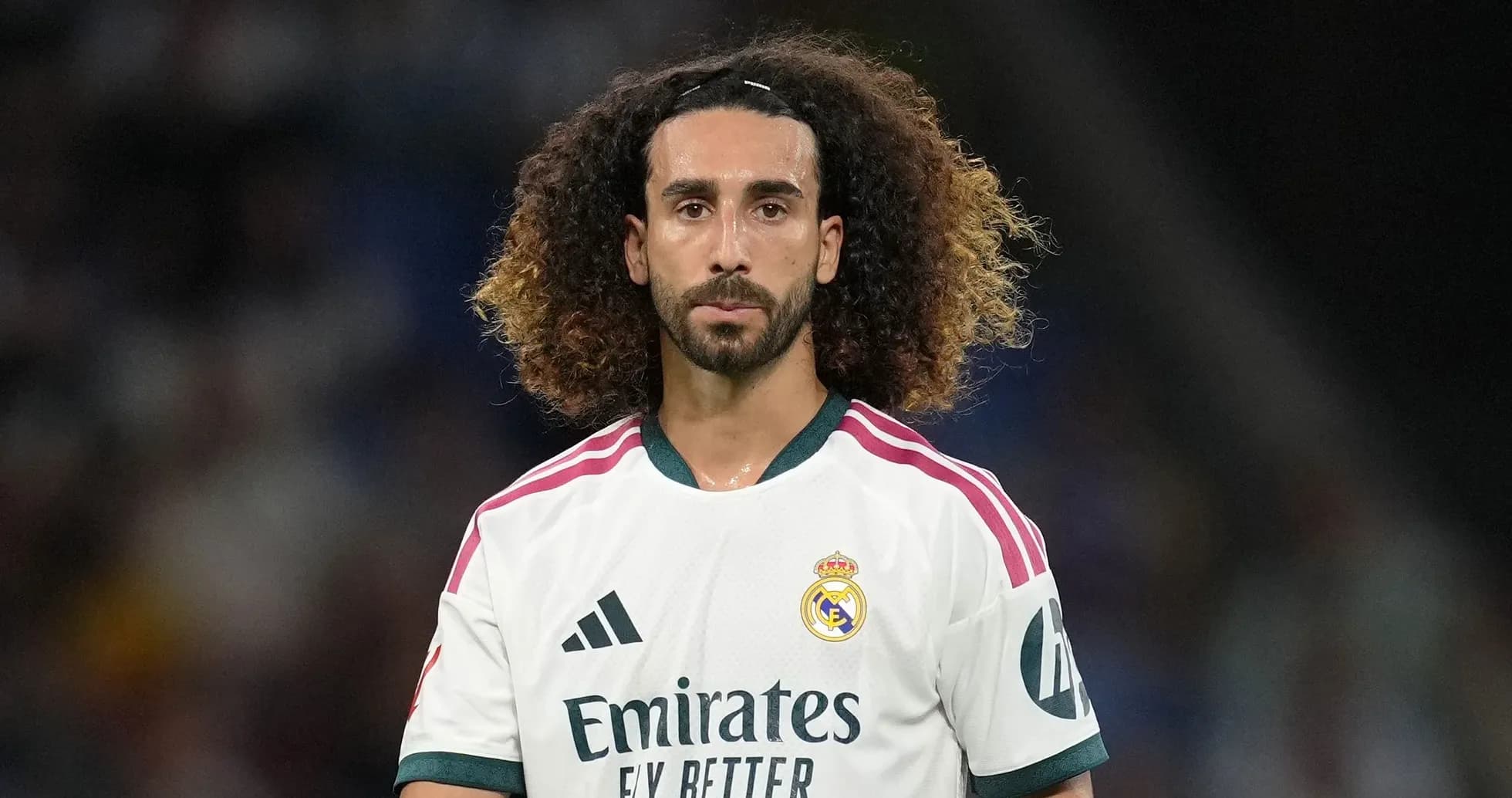 Player in Real Madrid jersey on the field Player in Real Madrid jersey on the field