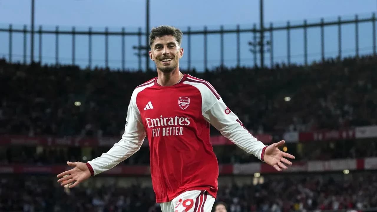 Arsenal player celebrating a goal at stadium Arsenal player celebrating a goal at stadium