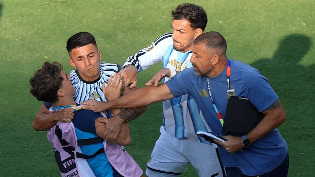 Players and coach involved in a confrontation on field Players and coach involved in a confrontation on field