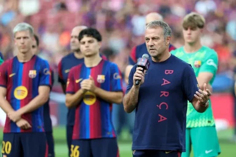 Manager speaking at FC Barcelona event with players Manager speaking at FC Barcelona event with players