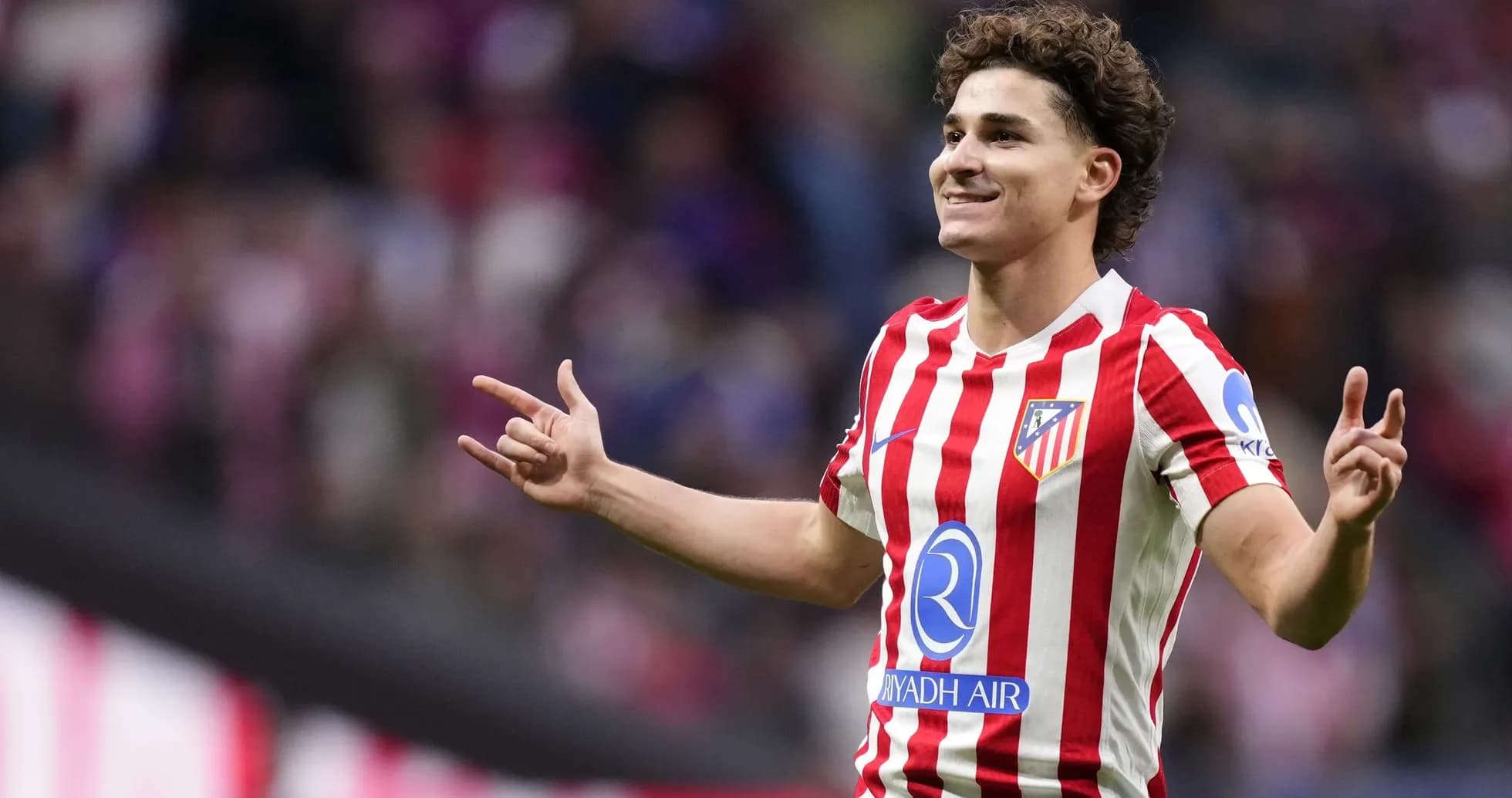 Atletico Madrid player celebrating a goal Atletico Madrid player celebrating a goal