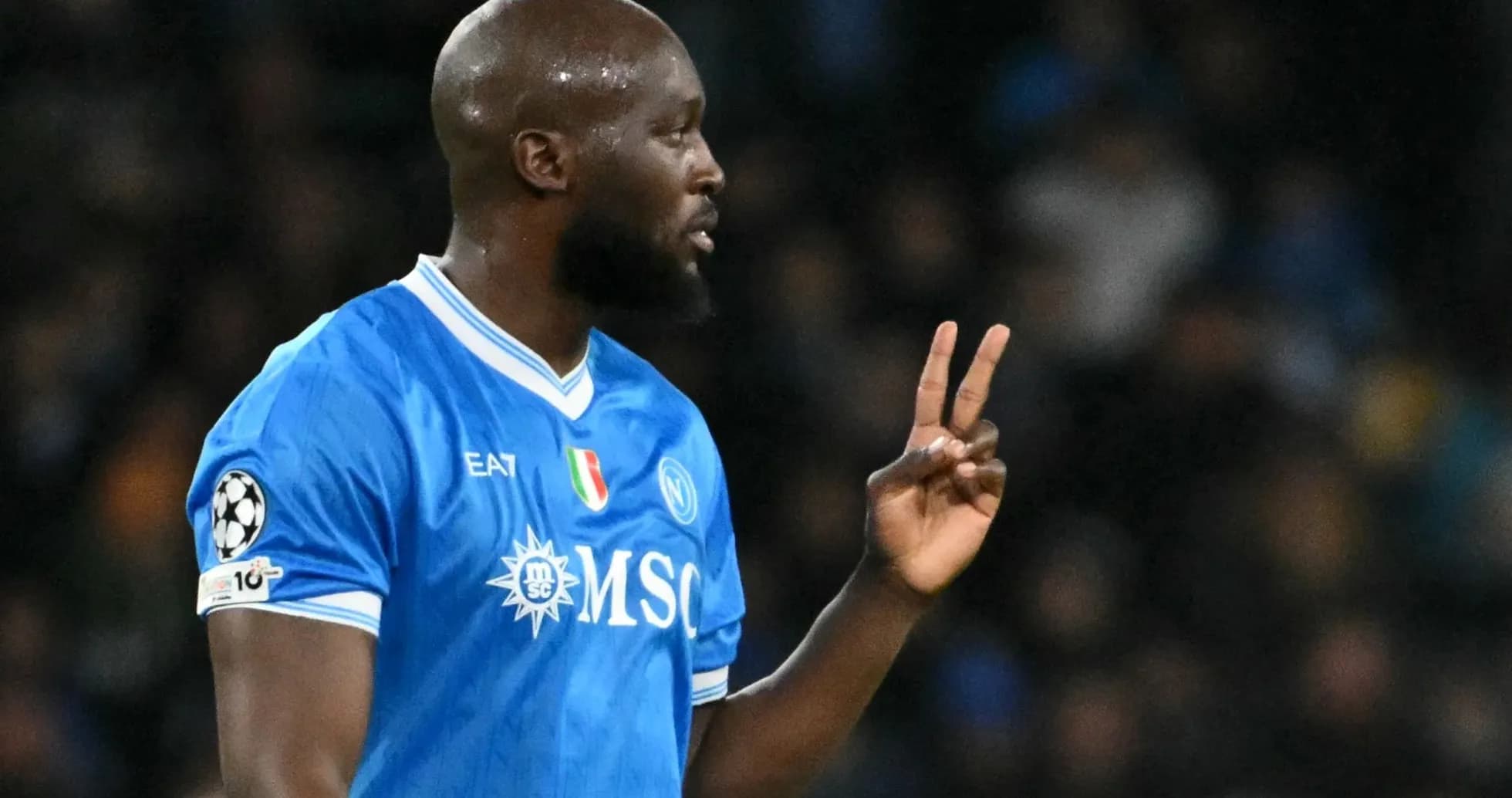 Player in blue jersey signaling during match Player in blue jersey signaling during match