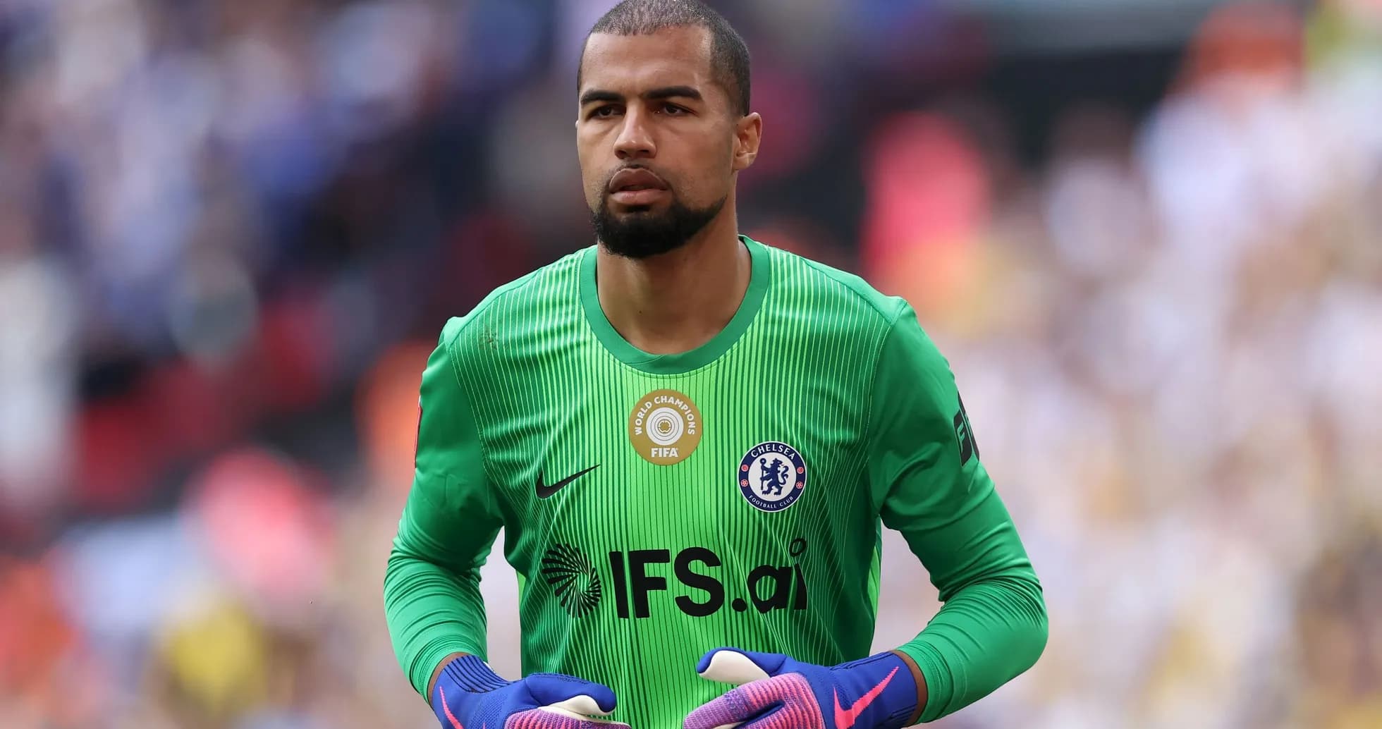 Goalkeeper in green kit preparing for match Goalkeeper in green kit preparing for match