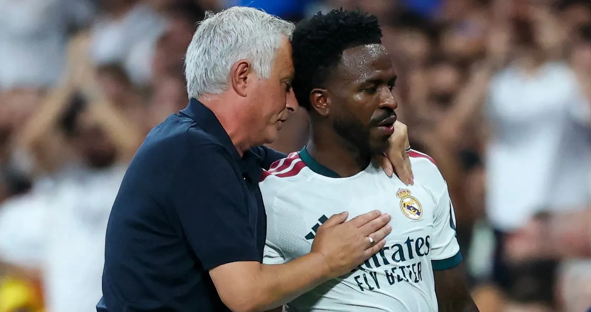Coach speaking to player during match moment Coach speaking to player during match moment