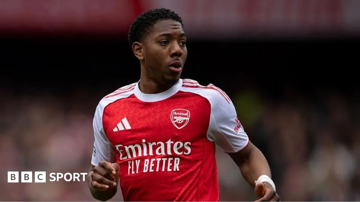 Player wearing Arsenal jersey during match action Player wearing Arsenal jersey during match action