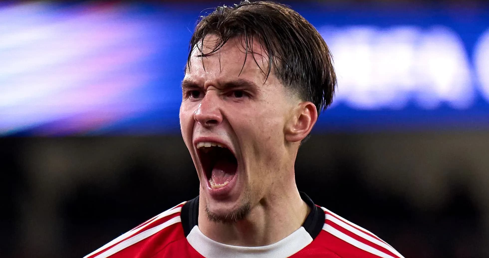 Player celebrating passionately after a goal Player celebrating passionately after a goal