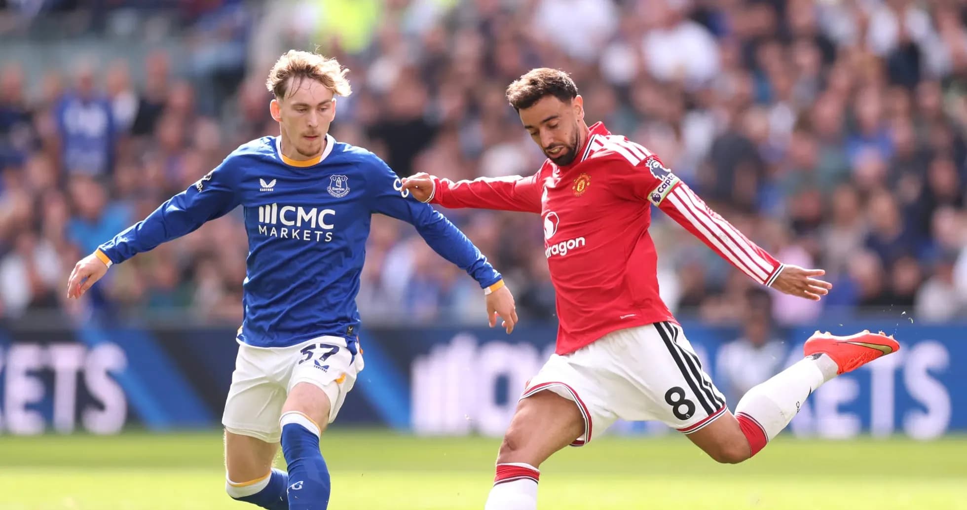 Everton and Manchester United players contesting for the ball Everton and Manchester United players contesting for the ball