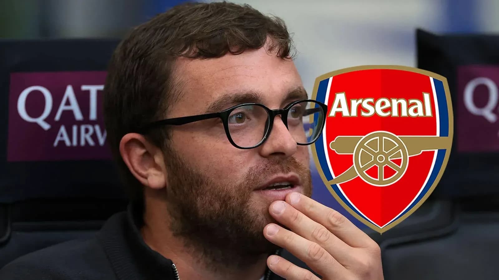 Person seated with Arsenal logo in background Person seated with Arsenal logo in background