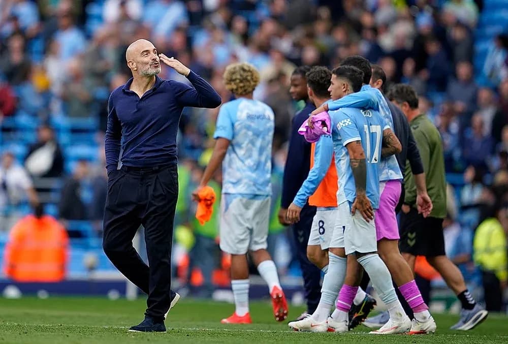 Manchester City players celebrating after the match Manchester City players celebrating after the match