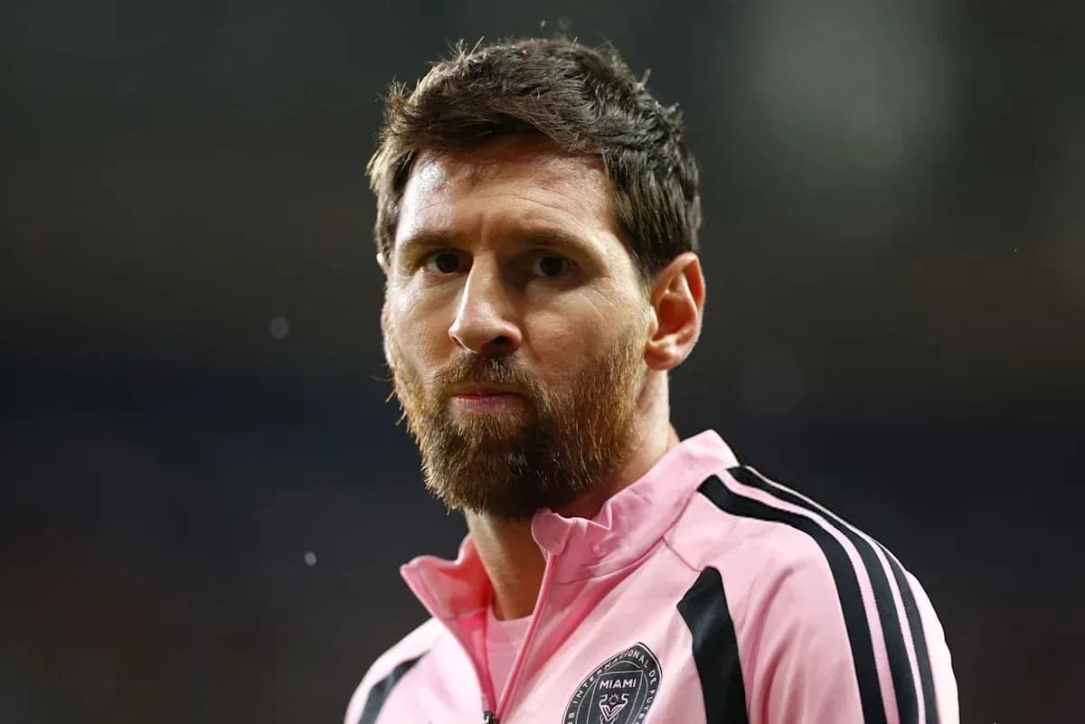 Player wearing pink jersey during match warm-up Player wearing pink jersey during match warm-up