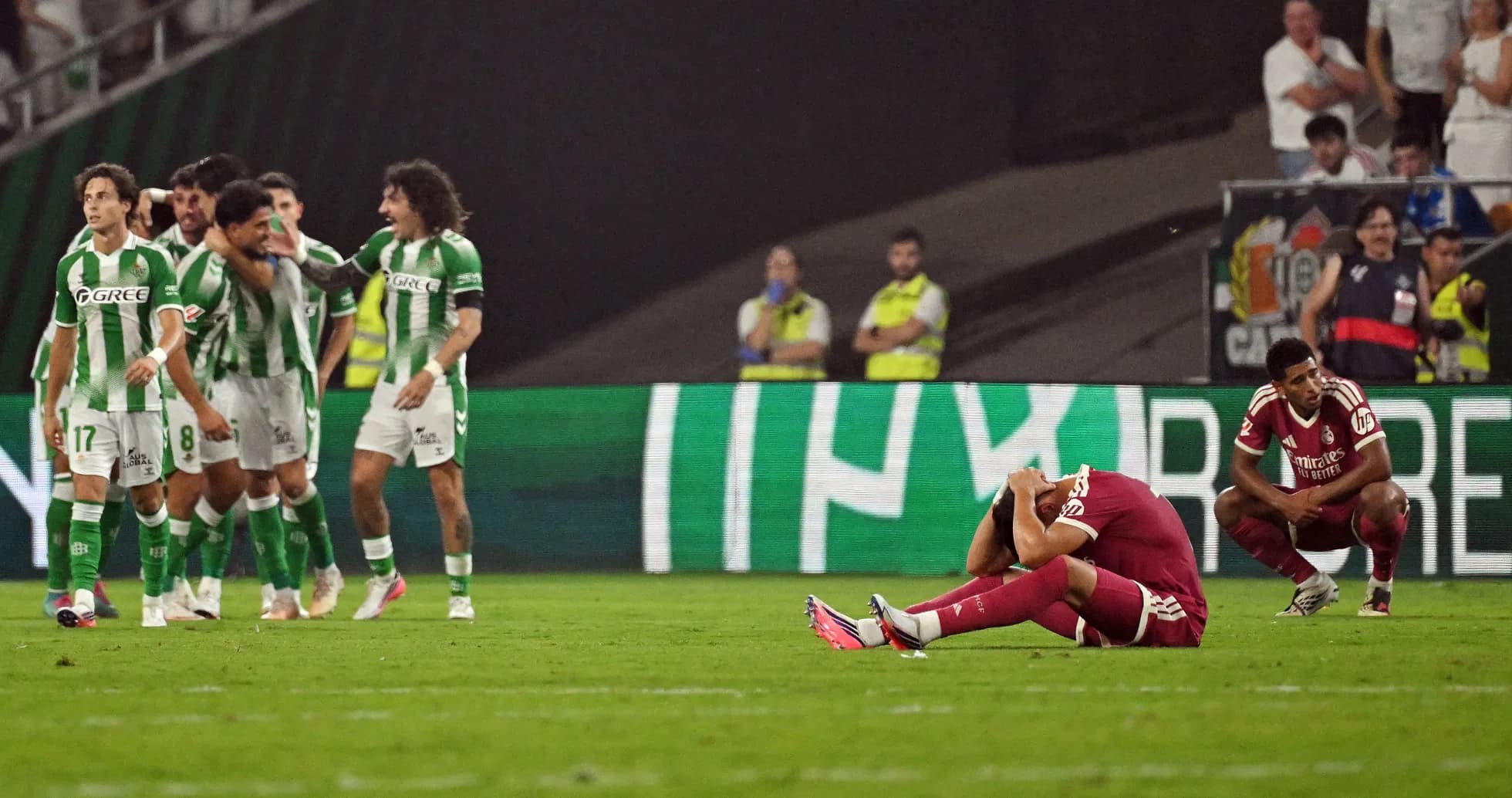 Players celebrating and others distressed after match Players celebrating and others distressed after match