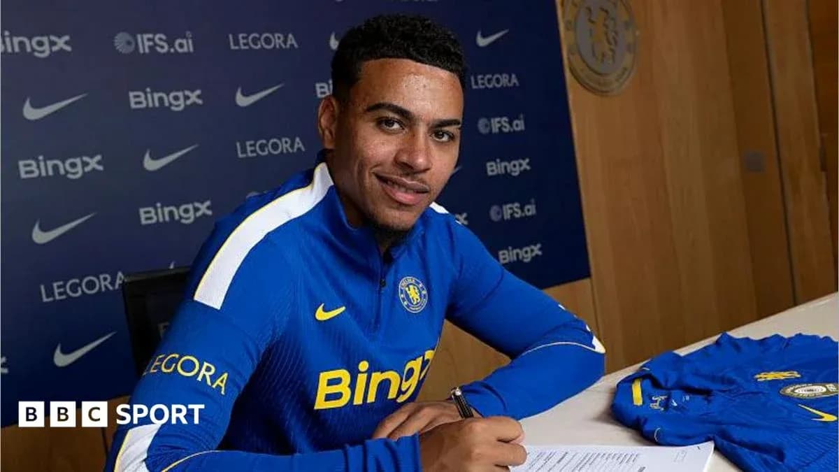 Player signing contract at club's announcement event Player signing contract at club's announcement event