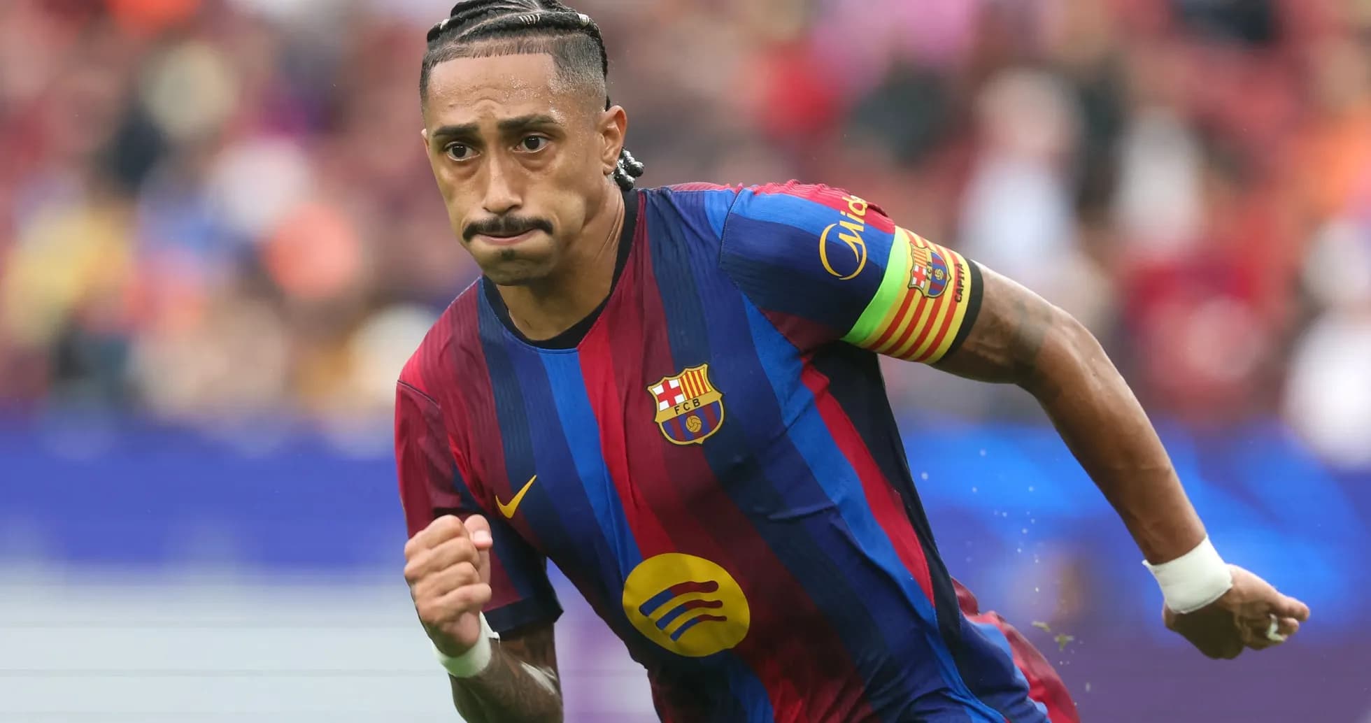 Barcelona player running on the pitch during match Barcelona player running on the pitch during match