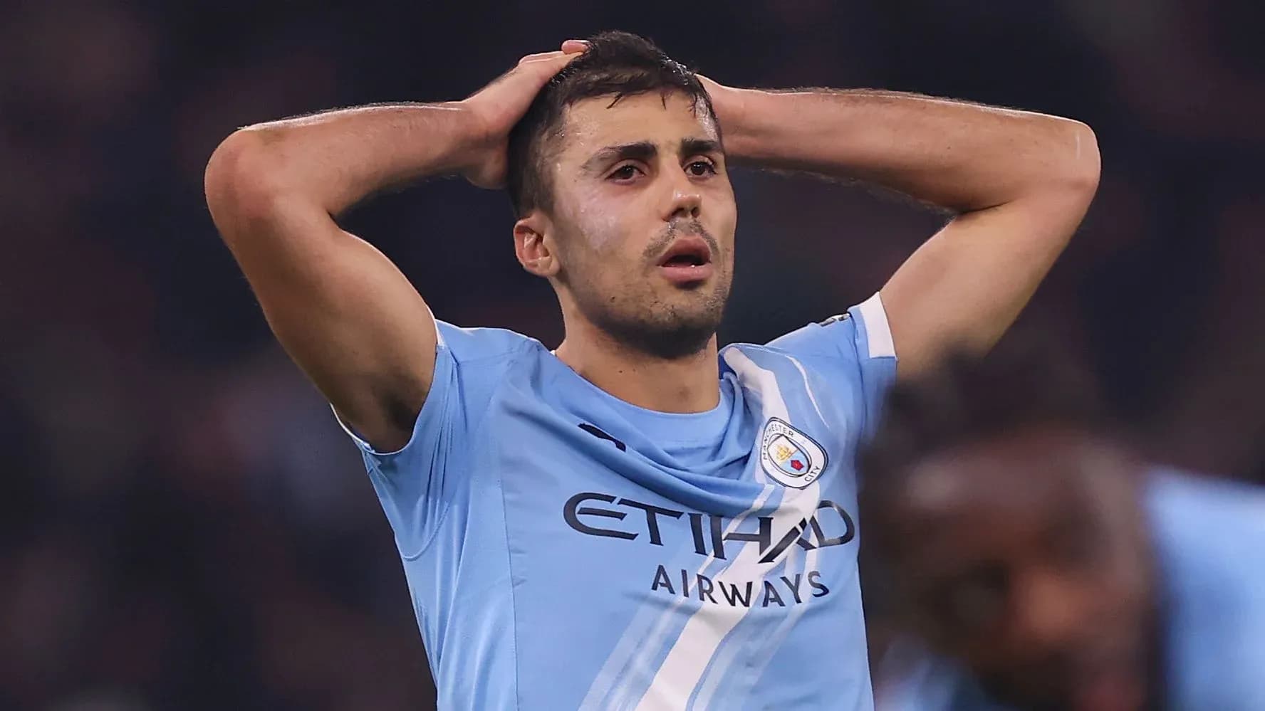 Player holding head in disappointment during match Player holding head in disappointment during match