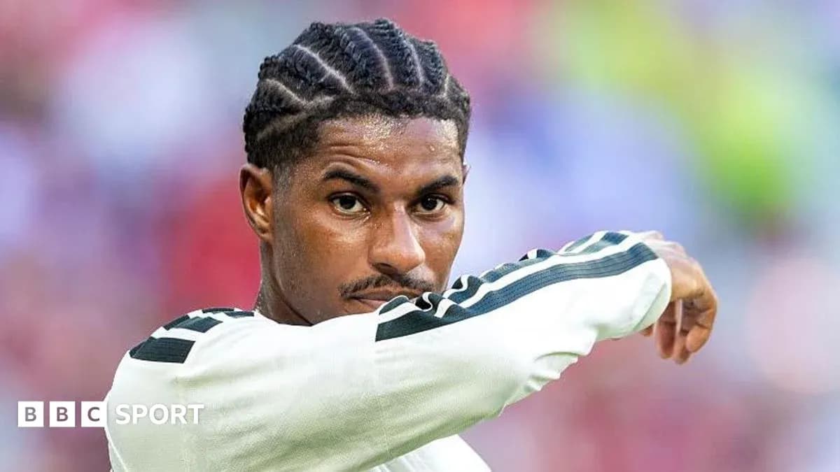 Player gesturing during a football match Player gesturing during a football match