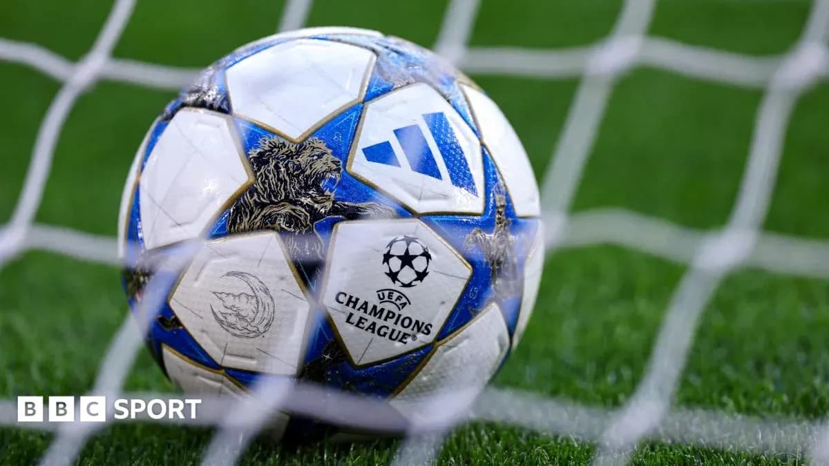 Close-up of UEFA Champions League soccer ball in net Close-up of UEFA Champions League soccer ball in net