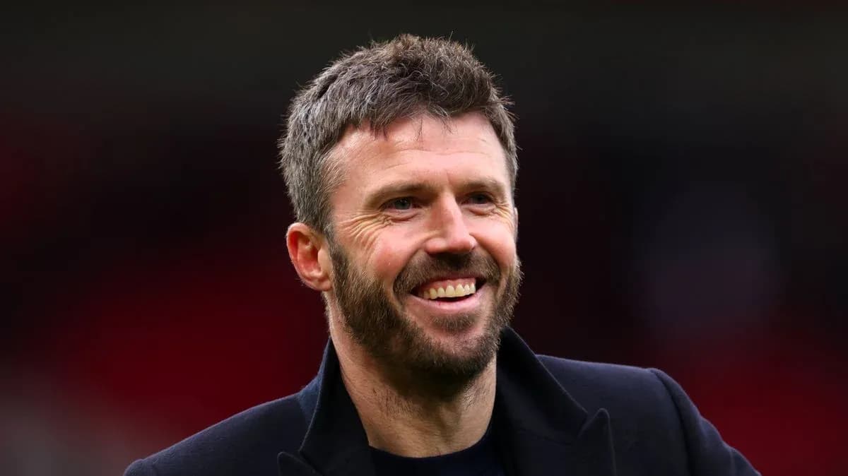Man smiling in a sports venue setting Man smiling in a sports venue setting