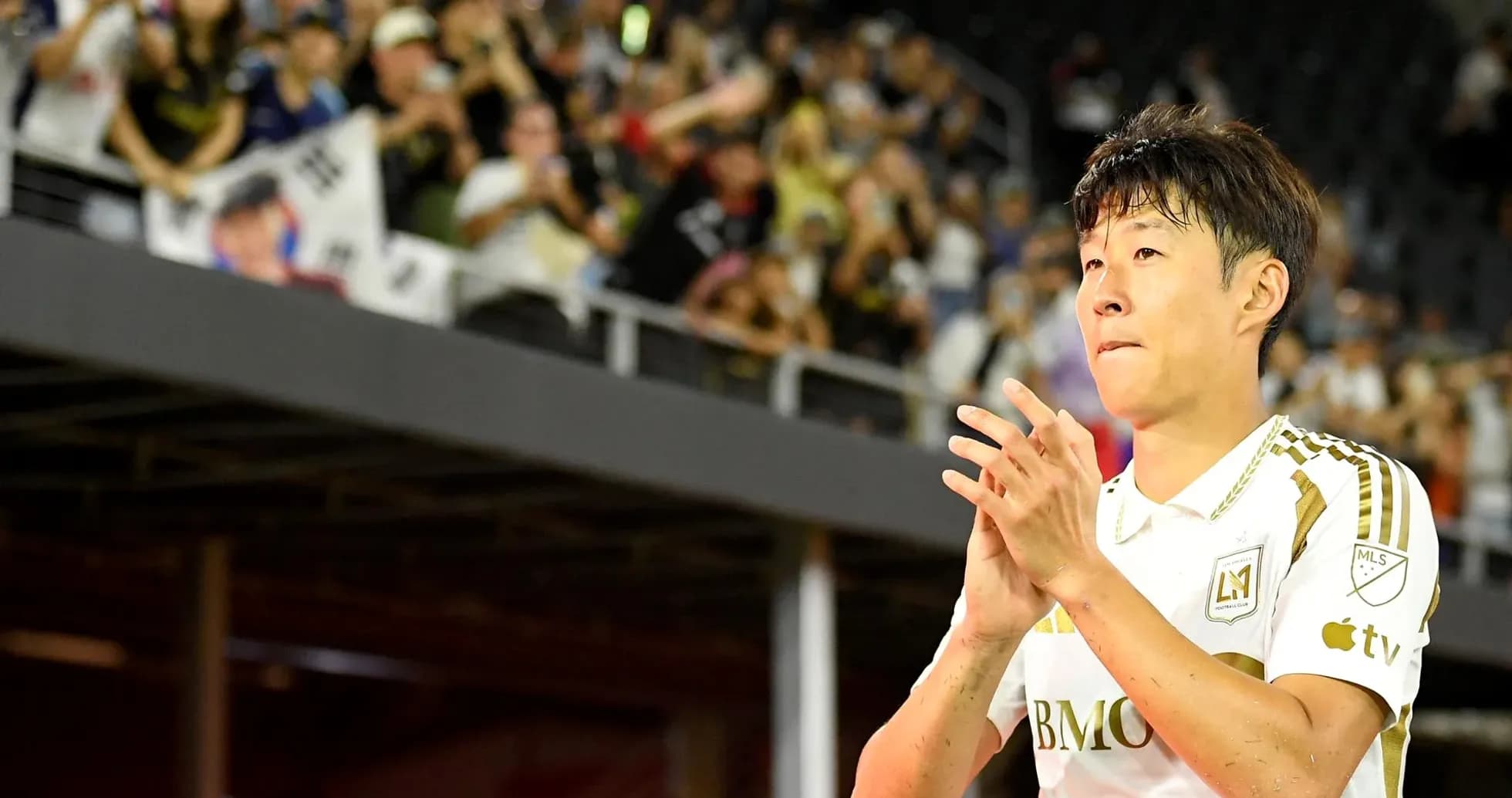 Player applauding fans after the match Player applauding fans after the match