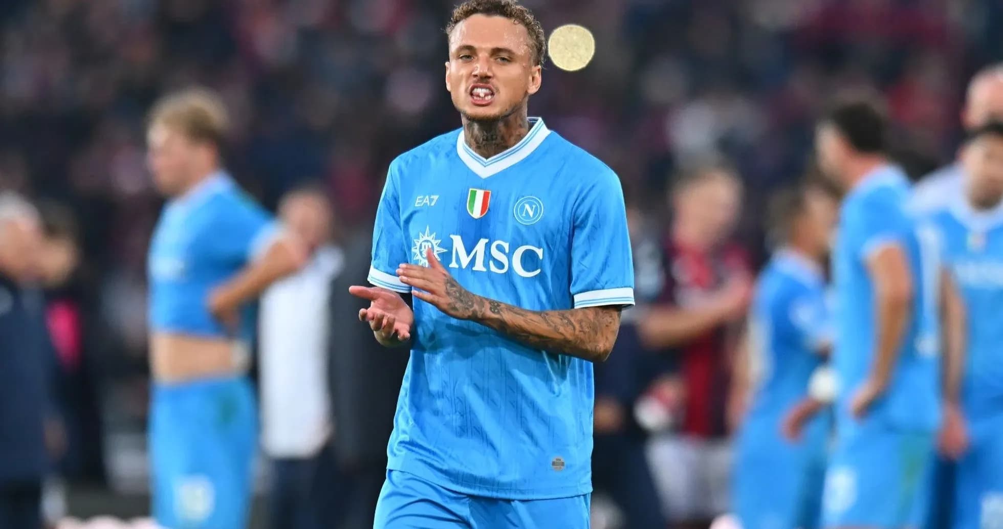 Player gesturing during match wearing Napoli jersey Player gesturing during match wearing Napoli jersey