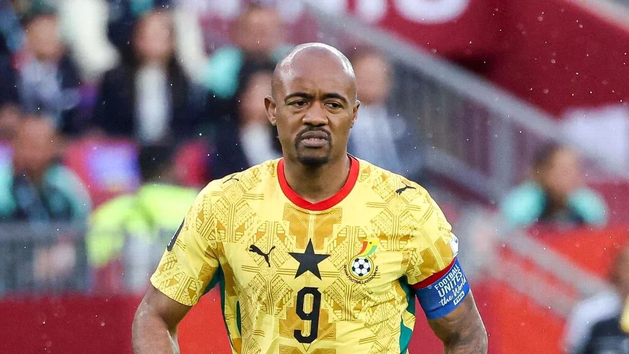 Ghanaian player walking on the field in match Ghanaian player walking on the field in match
