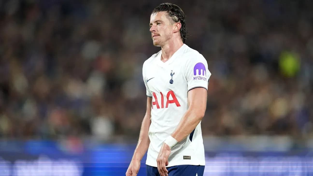 Tottenham player looking down during match Tottenham player looking down during match